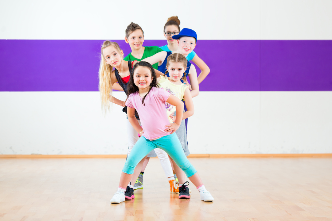 Kids Train Zumba Fitness in Dancing School